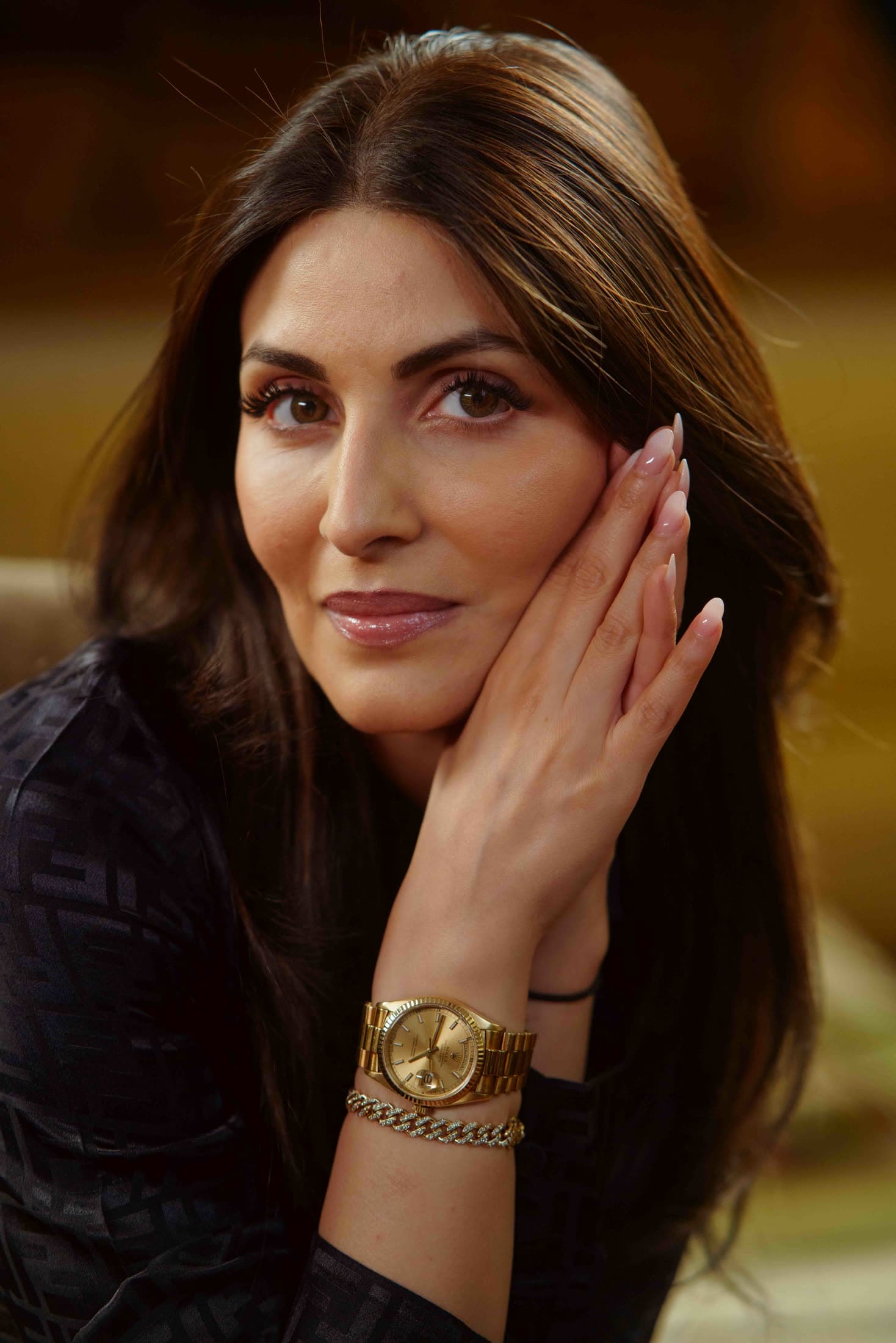 Golden-hour editorial portrait with gold jewellery